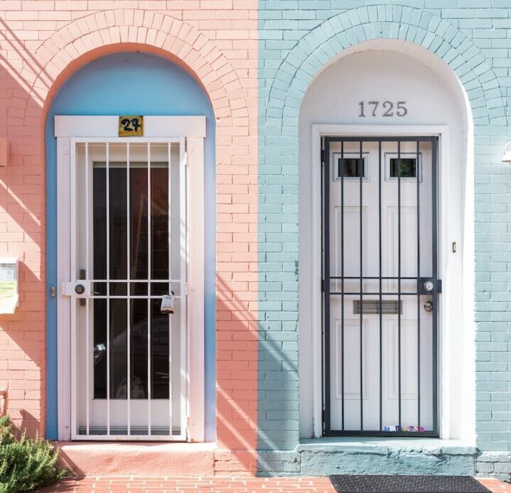 a/b testing two white wooden doors with grills