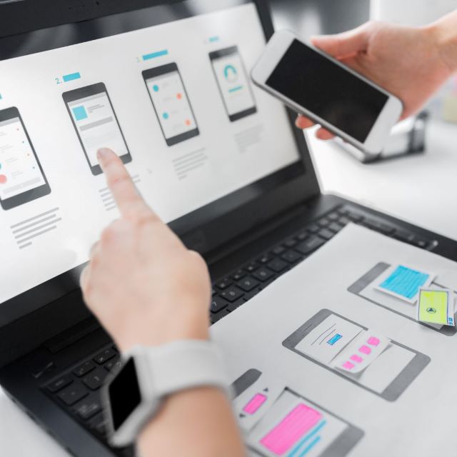 Key Elements to Make Your Website Accessible for Everyone 3 a person pointing at a computer screen